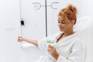 Woman enjoying IV fluid therapy in Boston