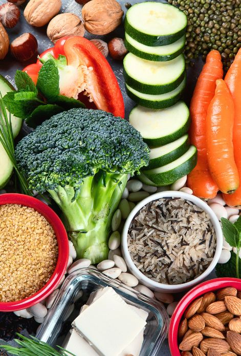 A vibrant spread of colorful fruits, vegetables, whole grains, and lean protein, representing the diverse range of nutrient-rich foods essential for managing metabolic syndrome.