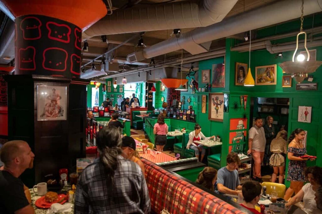 Colorful dining room at The Friendly Toast, one of the best places for gluten-free breakfast Boston visitors can enjoy.